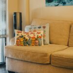Inside picture of light colored couch with pillow and seascape, Carolina Counseling located in Greenville, NC